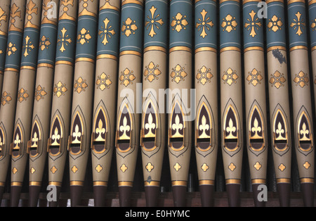 A view of decorated organ pipes in the parish church of St Andrew at Bacton, Norfolk, England, United Kingdom. Stock Photo