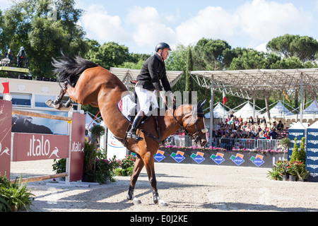 Robert Smith on Voila at the Piazza di Siena show jumping event in Rome in May 2013 Stock Photo