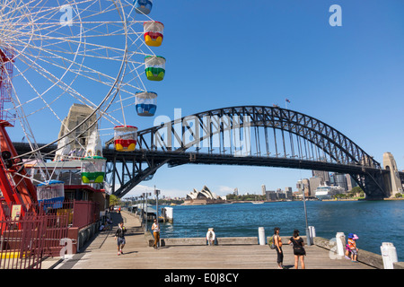 Sydney Australia,Milsons Point,Luna Park,amusement,Ferris Wheel,Harbour Bridge,harbor,Opera House,AU140310071 Stock Photo