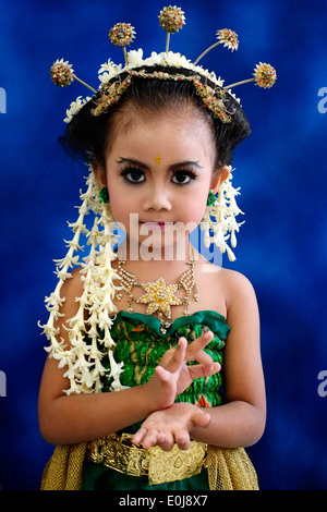 little girl poses in balinese fancy dress at school to commemorate the indonesian woman hero hari kartini held every april 21st Stock Photo