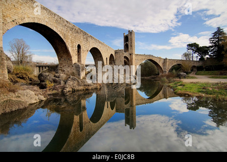 Romanesque bridge over the Fluvia river at Besalu, Girona, Catalonia. Stock Photo