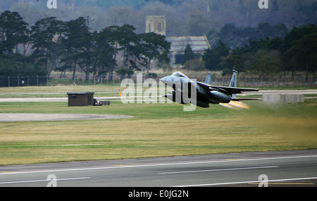 An F-15C Eagle from the 493rd Fighter Squadron takes off from Royal Air Force Lakenheath, England, March 6, 2014. The 48th Figh Stock Photo