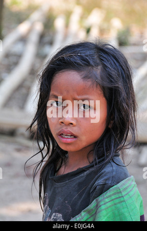 Young girl with long black hair from a Hmong village living along The Mekong River, Northern Laos, Lao, Southeast Asia Stock Photo