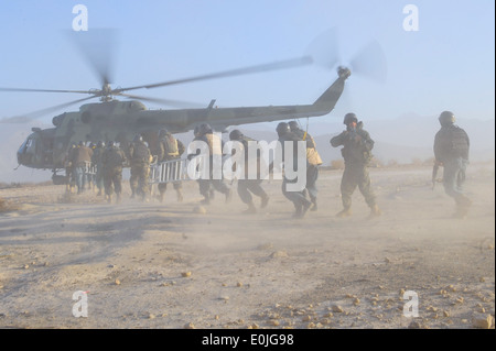 Members of the Afghan National Police Crisis Response Unit board a MI-17 helicopter during training conducted by International Stock Photo