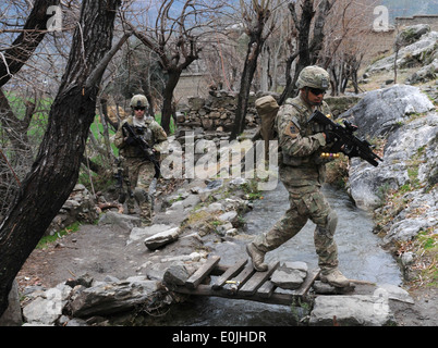 KUNAR PROVINCE, Afghanistan - U.S. Army Spc. Jesus B. Fernandez of San Jose, Calif., an assistant team leader with 3rd Platoon, Stock Photo