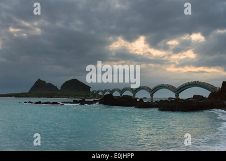 Eight-Arch Cross-Ocean Bridge at dawn, Sansiantai, Taitung County, Taiwan Stock Photo