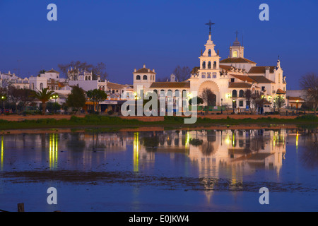 El Rocio village and Hermitage at Dusk, Almonte. El Rocio, El Rocío. Marismas de Doñana, Doñana National Park, Huelva province, Stock Photo