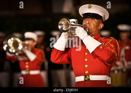 A member of the U.S. Marine Drum and Bugle Corps perform during an Evening Parade at Marine Barracks Washington in Washington, Stock Photo