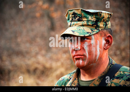 Cpl. Jacob Mills, assigned to 2nd Platoon, Fleet Antiterrorism Security Team Company Pacific, awaits further instruction while Stock Photo