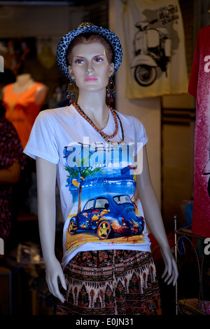 Female mannequin clothed in tropical feature T-shirt and skirt. Thailand S. E. Asia Stock Photo