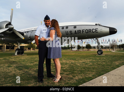 Airman Lance Humes receives a kiss from his girlfriend, Kt Rodgers at Lackland Air Force Base, Texas, April 4, 2013. Humes grad Stock Photo