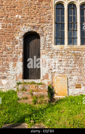 Side door to St Mary's church, Upton Hellions, Devon, England. Stock Photo