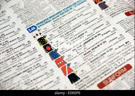 Horse racing pages in a newspaper with information guide Stock Photo