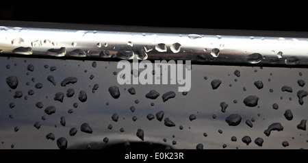 9477. Raindrops on car, Kent Stock Photo