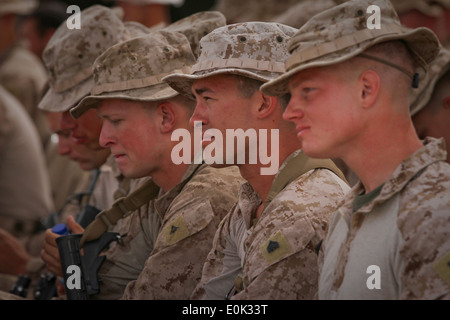 (From left) U.S. Marines Lance Cpl. Randall Paul, Sgt. Gregory Hartman, and 1st Lt. Alexander White, Marines serving with White Stock Photo