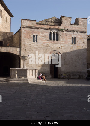 Bevagna, Umbria, Italy; view of the Romanesque church of San Silvestro and the fountain Stock Photo