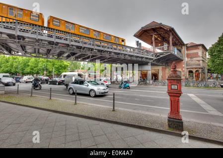The trendy neighbourhood of Kreuzberg in Berlin, with the elevated u-bahn line and Schlesisches Tor station. Stock Photo