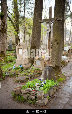 Skull on cross at old cemetery, Polish Cmentarz Zasluzonych na Peksowym Brzyzku w Zakopanem Stock Photo