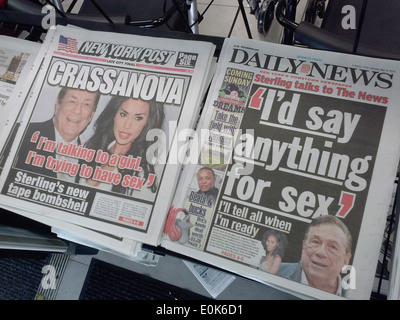 Headlines of New York tabloid newspapers are seen on Saturday, May 10, 2014 reporting on Donald Sterling and the NBA Stock Photo