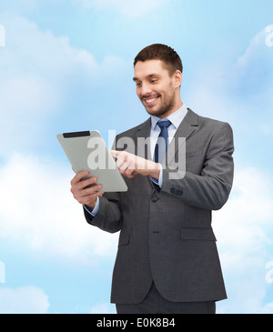 smiling buisnessman with tablet pc computer Stock Photo