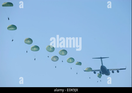 FORT BENNING, GA. – Army Rangers parachute from a U.S. Air Force C-17 Globemaster III during Ranger Rendezvous 2009 over Ft. Stock Photo