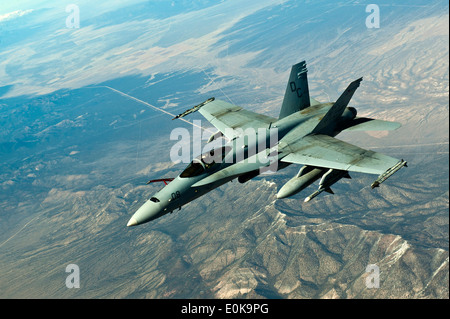 A F/A-18 Hornet, U.S. Marine Corps, flies in a training mission during Red Flag 12-3 March 9, 2012, over the Nevada Test and Tr Stock Photo