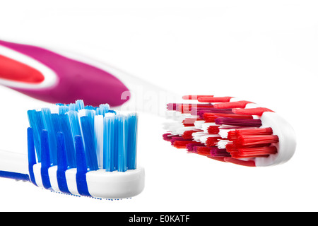 Macro of two new unused toothbrush heads isolated on white. Stock Photo
