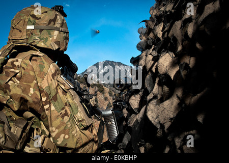 KUNAR PROVINCE, Afghanistan – U.S. Army Spc. Brian S. Ellis, an MK46 gunner from Canyon Lake, Texas, assigned to Troop C, 1st Stock Photo