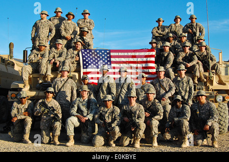 Soldiers from Platoon 3, Company C, 2nd Bn., 35th Inf. Regt., 25th Inf. Div., say good-bye to Platoon Leader 1st Lt. Damon Hart Stock Photo