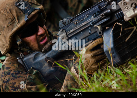 U.S. Marine Corps Sgt. Kevin Cicik, a student attending Infantry Squad Leaders Course (ISLC), School of Infantry, West, maintai Stock Photo