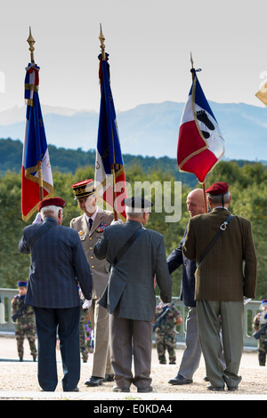 World War 2 veterans attending parade and marching in Pau in the Pyrenees, France Stock Photo