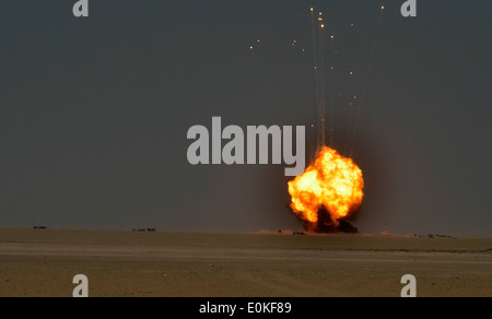 Munitions being detonated by the 753rd Ordnance Company from the West Virginia Army National Guard at an EOD range in the deser Stock Photo