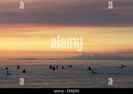 San Diego, CA, USA. 15th May, 2014. May 15, 2014 - San Diego, California, USA - Surfers wait for waves at La Jolla Shores Beach as smoke from recent wildfires fills the air. Credit:  KC Alfred/ZUMAPRESS.com/Alamy Live News Stock Photo
