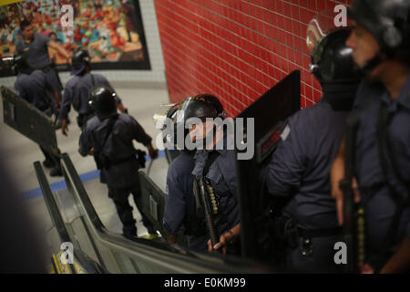 Sao Paulo, Brazil. 15th May, 2014. Police guard during a protest against the spending for the 2014 FIFA World Cup in Sao Paulo, Brazil, on May 15, 2014. Brazilians frustrated with poor public services took to the streets Thursday across the country, claiming their taxes are spent on preparations to host the upcoming 2014 World Cup. Credit:  Rahel Patrasso/Xinhua/Alamy Live News Stock Photo