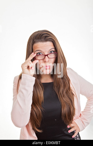 woman looking over top of glasses Stock Photo