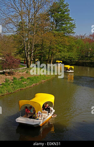 The Luisenpark (41 hectares) is a municipal park in Mannheim, Baden-Württemberg, Germany, whose attractions include a greenhouse, 'gondoletta' boats and a variety of facilities for children. Along with the Herzogenriedpark (33 hectares; on the other side Stock Photo