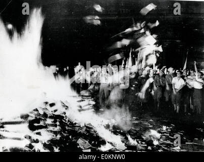 tudents and other Nazis seen as they throw 'anti-German' literature on to the huge bonfire Stock Photo