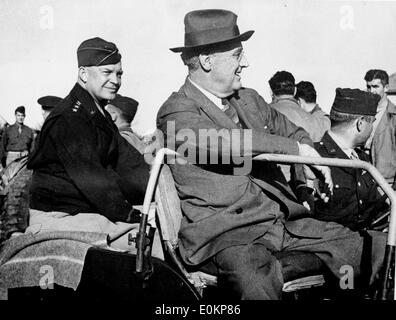 Presidents Franklin Roosevelt and Eisenhower ride in a jeep Stock Photo