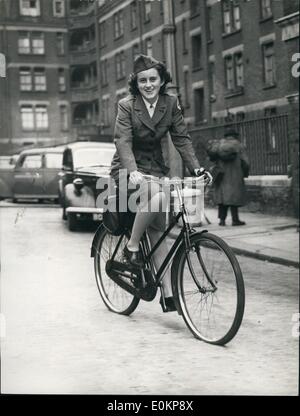 May 05, 1944 - Former U.S. Ambassadors daughter here to work for US Red : Miss Kathleen Kennedy, daughter of Mr. Joseph Kennedy former American Ambassador to St. Britain has arrived in London to work for the American Red Cross. Photo shows Miss Kathleen Kennedy with her bicycle ior she uses for  work in London. Stock Photo