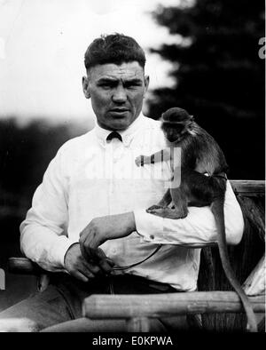 Boxer Jack Dempsey with a monkey Stock Photo