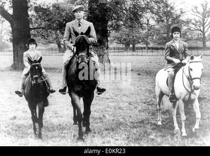 King George with daughters Princess Elizabeth and Margaret riding horseback Stock Photo