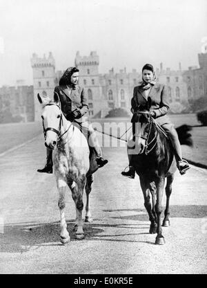 Elizabeth II and Princess Margaret ride horseback Stock Photo