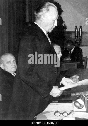 Konrad Adenauer reads proxy at law passing Stock Photo