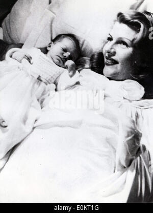 Dec 28, 1949 - Lausanne, Switzerland - RITA HAYWORTH with her newly born daughter Princess YASMIN AGA KHAN.. Stock Photo