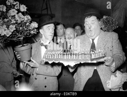 Comedians Stan Laurel and Oliver Hardy at a birthday party Stock Photo