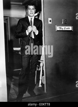 Actor Tony Curtis coming out of his dressing room Stock Photo
