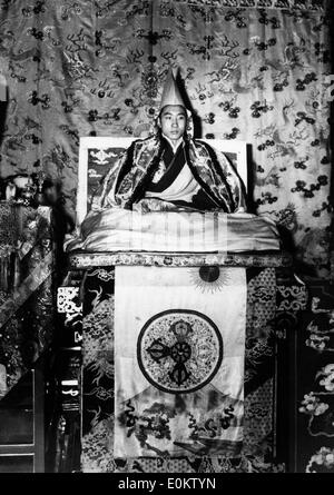The 14th Dalai Lama upon his throne in Tibet Stock Photo