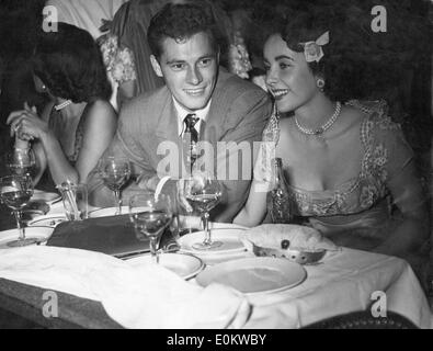 Actress Elizabeth Taylor with heir Nicky Hilton at dinner Stock Photo