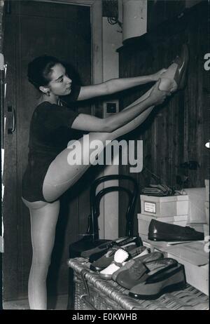 Jun. 23, 1950 - Sadlers wells Ballerinas Try on Shoes for their American tour as Britain's fashion's fashion Ambassadors. The Sadlers wells ballerinas are to again act as Britain's Fashion ambassadors when they go on their American tour in the Autumn. At Covent Garden today, Margot Fonteyn, Pamela Robert Helpman were fitted for their casual shewed, Supplied by Barfield & Richardson of Norwich ,who are fitting the whole Company with casual shoes. Photo shows can you do this? Gillian Lyn is seen trying on her casual shoes. Stock Photo