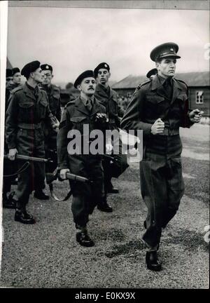 Nov. 03, 1950 - Lieut. Eden Leads His Detachment, At the Double. Inspection of the King's Royal Rifle Corps. His Majesty the King today inspected the 1st Battalion the King's Royal Rifle Corps at their depot at Winchester, and this picture 2/Lieut. Eden, son of Mr. Anthony Eden M.P., second in seniority only to Winston Churchill in the Conservative Party, is seen as he leads his detachment at the double past the King. It is a privilege of the Regiment to double past the King during an inspection. Stock Photo